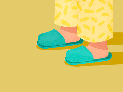 Person wearing pajamas and slippers walking indoors