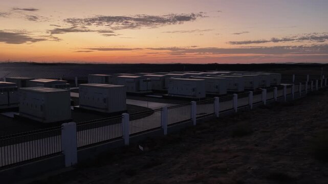 Aerial View of Utility-Scale Solar Farm with Battery Energy Storage System in Arid Desert