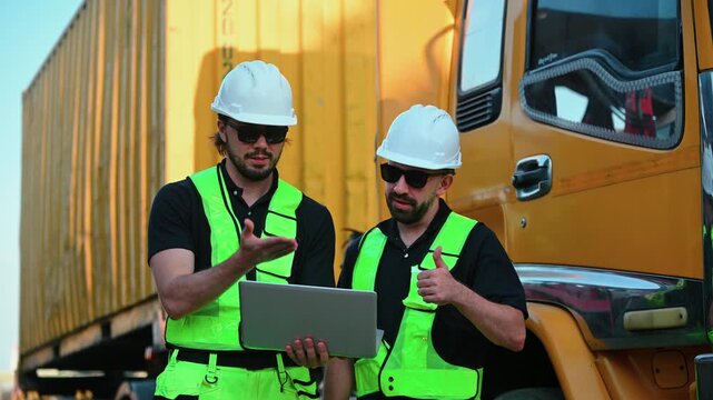 Logistics engineer beside a freight truck, managing cargo transport, supply chain operations, shipping and import-export logistics, supporting equipment inspection, maintenance and utility operations.