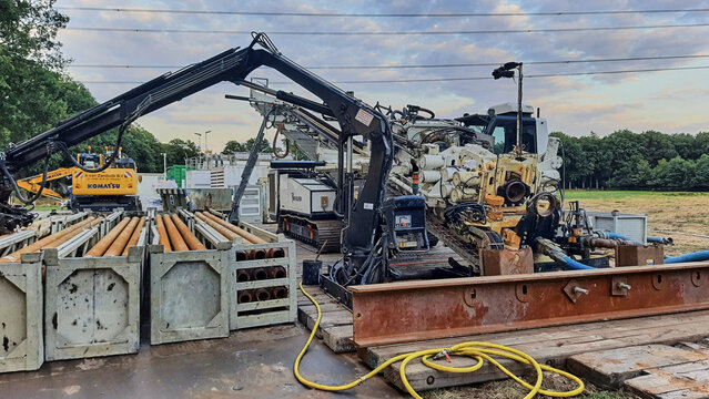 Heavy horizontal drilling rig for high voltage line installation under a railroad in Hoogeveen Netherlands Heavy horizontal drilling rig ready for high voltage line installation under a railroad