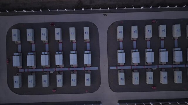 Aerial View of Utility-Scale Solar Farm with Battery Energy Storage System in Arid Desert