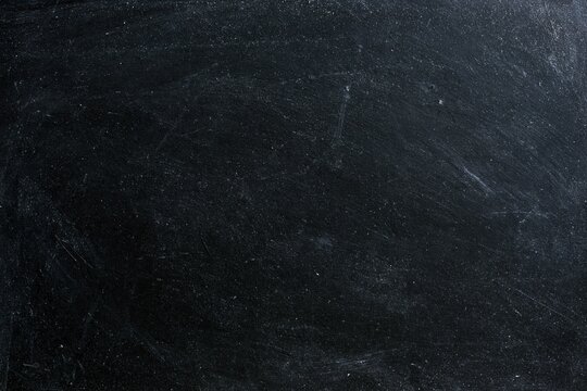 The Chalkboard Texture: A Weathered Black Slate Backdrop for Design