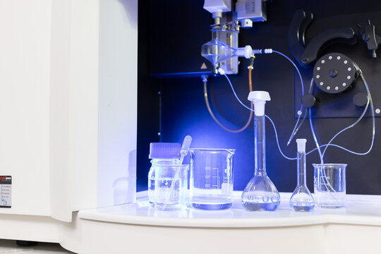 Laboratory scene showing glassware and equipment during a scientific experiment in a research facility