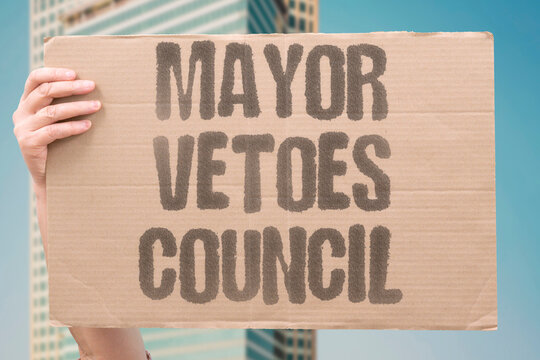 "Mayor Vetoes Council" A mayor vetoes a council decision on a local development project. MAYOR. VETO. COUNCIL. DEVELOPMENT. LOCAL.