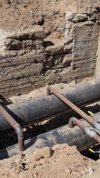 Inspection of underground pipes at a construction site in a dry area