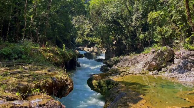 River flowing through Semuc Champey jungle 