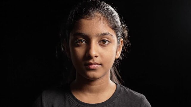 Portrait of a Serious Young South Asian Girl in Studio