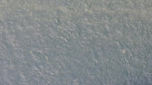 rocks under the surface of the water