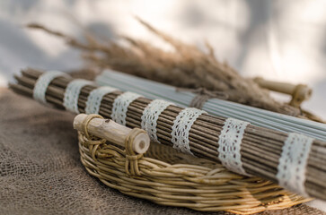 Obraz premium Natural Handmade Decor with Wicker Basket and Dried Grass