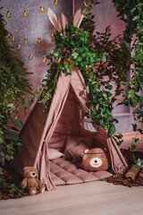 Fairytale den for a child in the woods with plush bears and magic lights © Minakryn Ruslan 