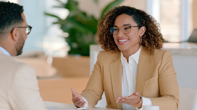 Warm professional interview scene with two people at table