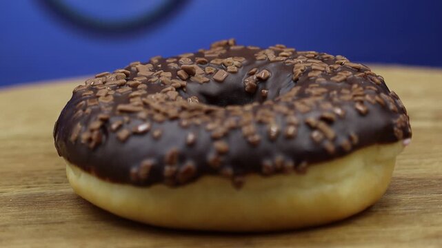 MVI chocolate glazed donut close up.
