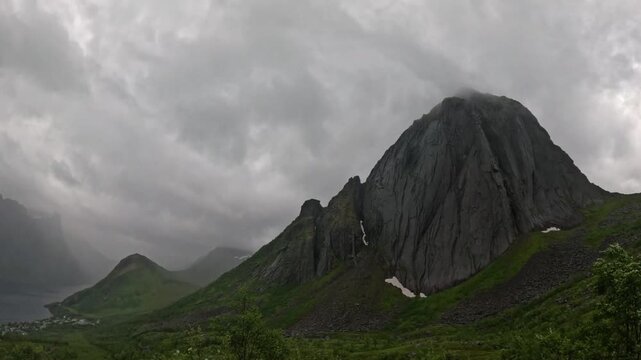 Ultra wide static view of iconic Segla mountain peak and fjord valley in Senja Norway