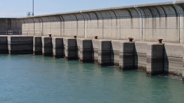Concrete sea wall protecting the harbor