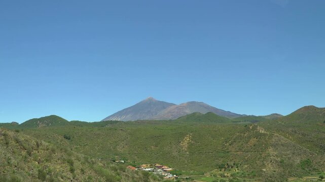 An exhilarating car journey across Tenerife Island with stunning views of the majestic Mount Teide in 4k slow motion 60fps