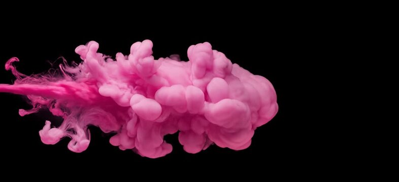 pink ink cloud in water isolated on black background