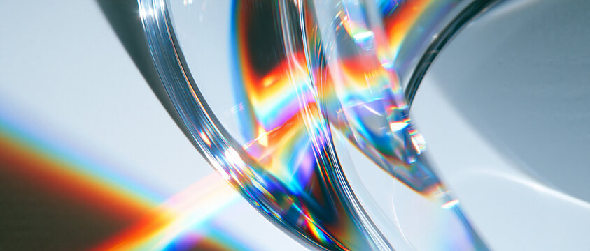 Rainbow prism reflections on glossy 3D glass sculpture