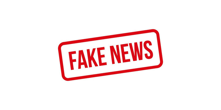Red rubber stamp imprint that says fake news for disinformation and media criticism.
