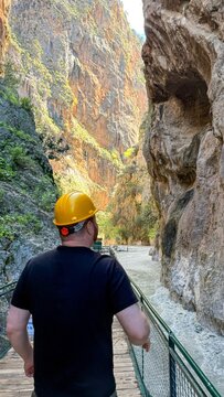 Dramatic canyon views showcase rugged rock formations; towering cliffs suggest adventure and exploration; perfect for nature lovers seeking breathtaking scenery