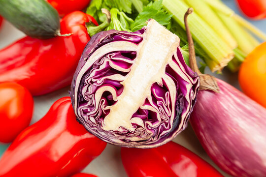 sliced red cabbage vegetable mix on wood background