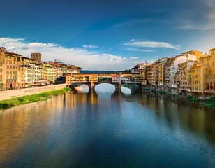 Fototapeta premium panoramic view of medieval stone bridge ponte vecchio over arno river in florence firenze tuscany italy europe florence cityscape architecture and landmark of florence and italy