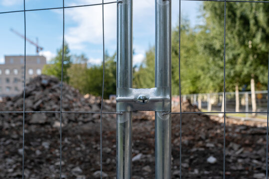 Metal Connector of Temporary Construction Fence at Demolition Site