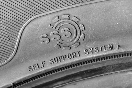 Self Support System SSS Marking on Run Flat Tire Sidewall Showing Reinforced Tire Technology Close-Up