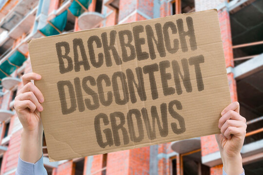 "Backbench Discontent Grows" Backbench discontent grows over government policy direction. BACKBENCH. DISCONTENT. GROWS. POLICY. DIRECTION.