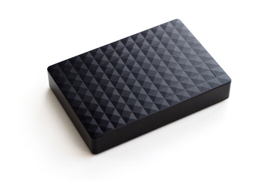 Black external hard drive on a white background
