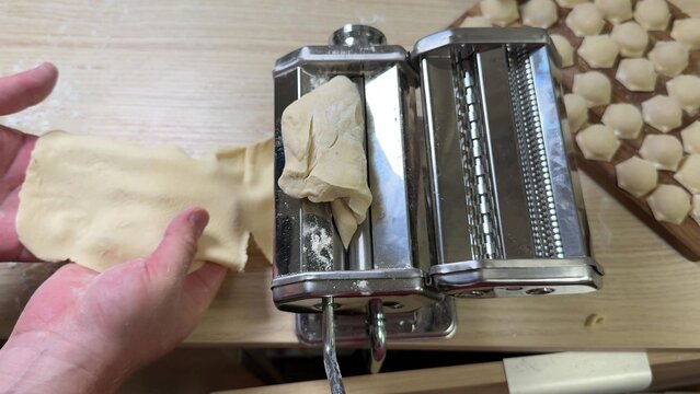 Close up view of a vintage bread maker appliance on a wooden surface, suggesting baking preparation or culinary routine, perfect for home kitchen themes, rustic cooking ideas