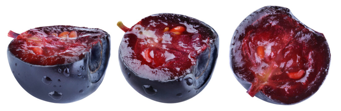 Three cut bilberries shown from different angles with red juicy flesh isolated on transparent background.