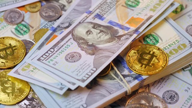 Background with US Dollar and Euro bills, BTC bitcoins rotating