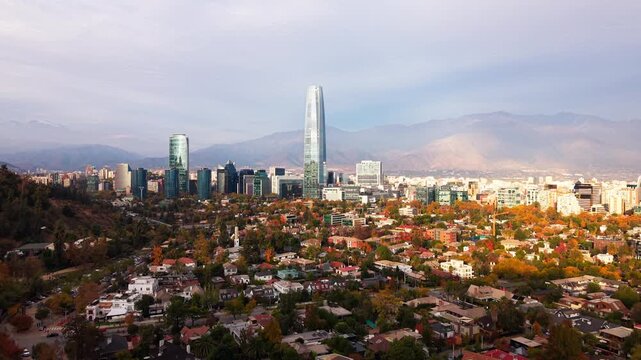 Aerial Horizontal Zooming Out Shot of Santiago Skyline and Andes Mountain Range, Autumn, Chile