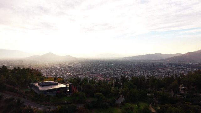 Drone Horizontal Backward Flight Panoramic View of Santiago City Valley from San Cristobal Hill, Chile
