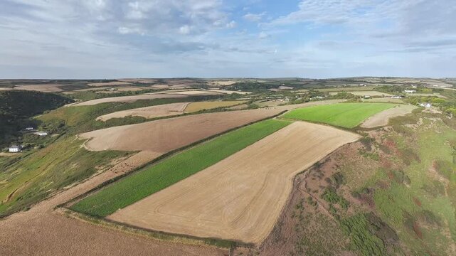 Cliffs and Farms over North Devon and Cornwall Coastpath Border from a drone, Welcombe Mouth Beach, Devon, Cornwall, England, Summer 2026