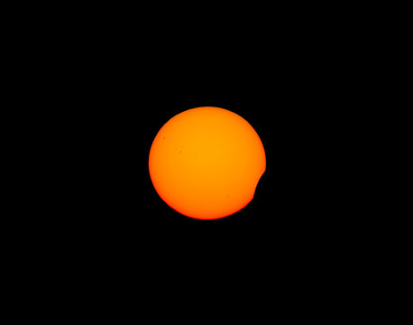 Real image of the partial Solar Eclipse of August 12 2026. Natural Astronomical Phenomenon. Shadow of the Moon and Aura of Solar Corona. 