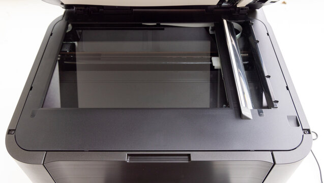 Close up view of an open black office scanner
