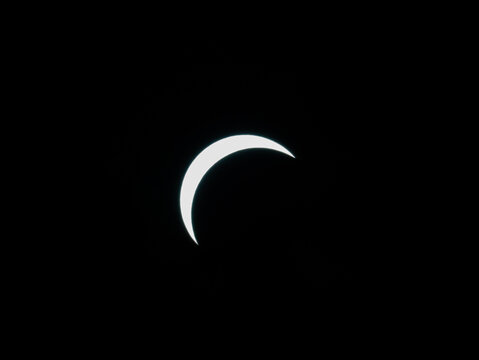 Partial solar eclipse visible over London, United Kingdom, photographed at 7:09 PM BST on August 12, 2026, capturing the Moon passing across the Sun during a rare astronomical event.