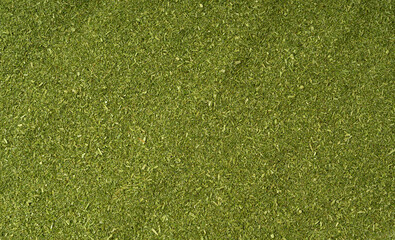 Fototapeta premium Green grass powder, dry ground barley sprouts