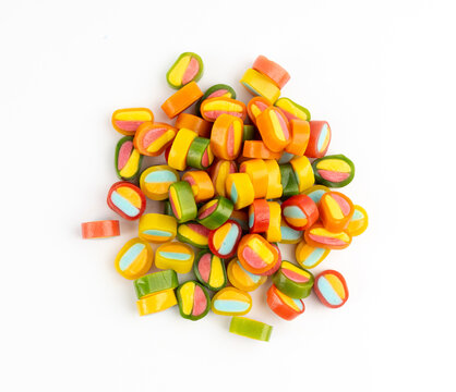 Round gummy candy piles set isolated. Small chewing colorful jellybeans, marmalade cuts, pills