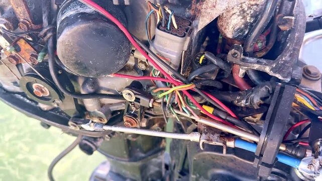 Close up of a running outboard boat engine