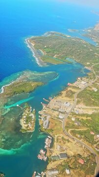 Aerial view of Roatan island coastline and Caribbean sea in Honduras