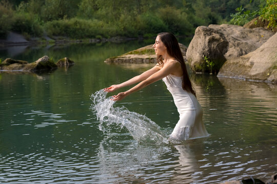 A Lovely Model Poses Outdoor While Enjoying The Summer Weather