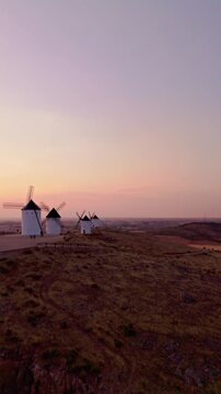 Traditional spanish windmills at sunset in la mancha