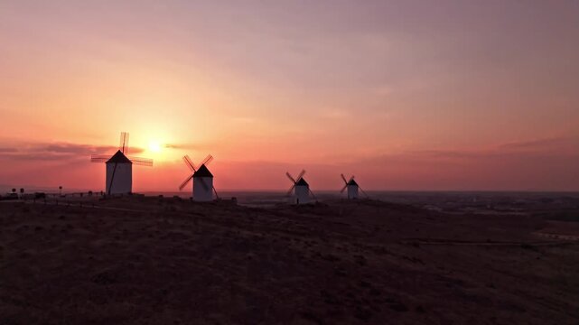 Aerial view of don quixote windmills at sunset in spain