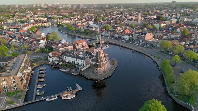 Windmill De Adriaan, since 1779. Old Windmill from the 18th century in Haarlem, Netherlands. Aerial View at Sunset time
