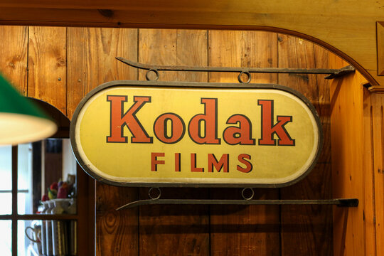Vintage Kodak Films advertising sign displayed on wooden wall