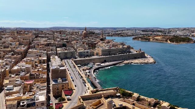 Cinematic 4K Aerial Drone Shot of Valletta Grand Harbour Fort St Angelo and Malta Three Cities