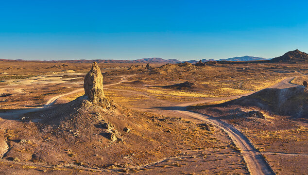Aerial Trona Pinnacles Desert Landscape with Dirt Roads and Rugged Rock Formations