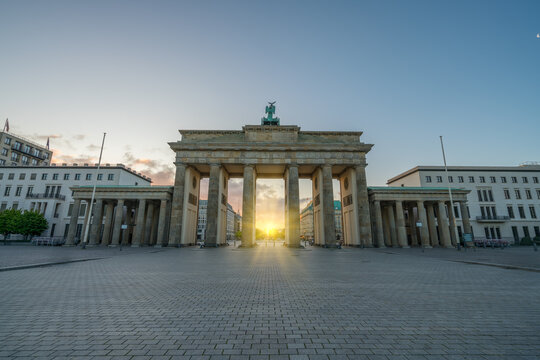 The Brandenburg Gate at sunrise. Public landmark of Berlin, Germany 